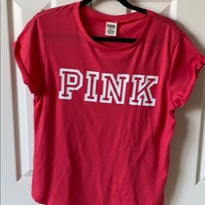 Pink top, never been worn.